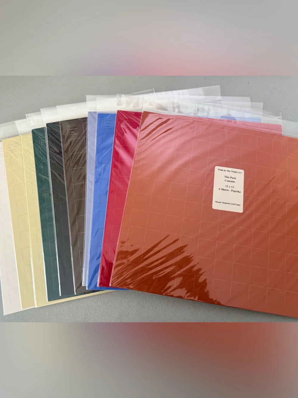 Paper Lot- multiple colors-10 12x12 Packs
